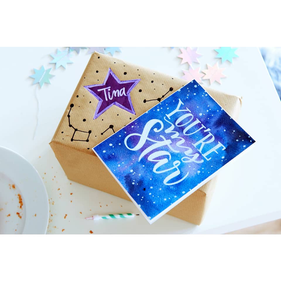 Geschenkverpackung, Kartenaufkleber?, Sternenkonstellation, Streifentext?, Konfetti?