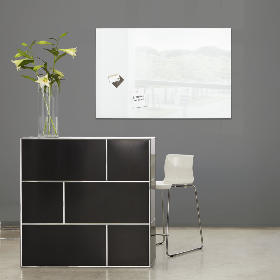sideboard, cabinet, black panels, chrome trim, vase with flowers