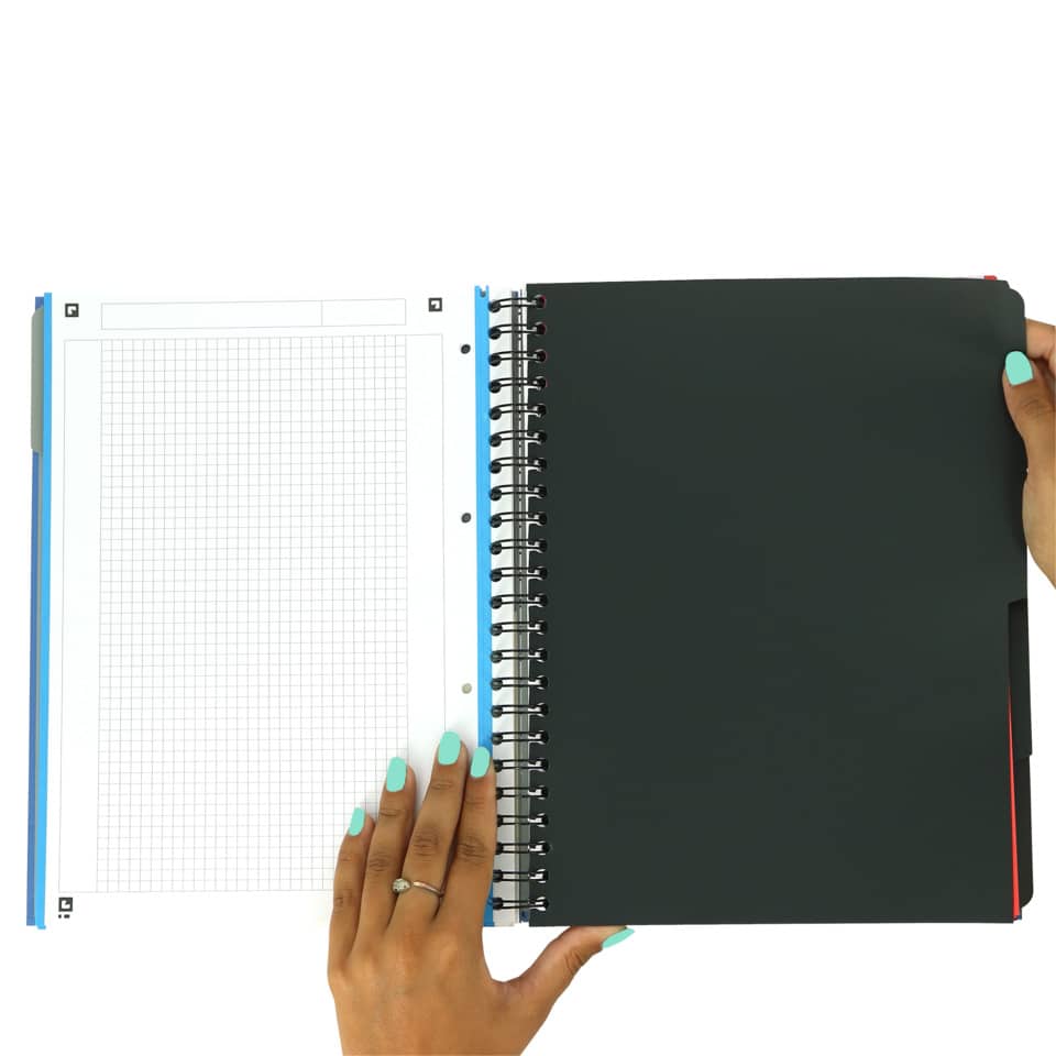 spiral notebook, black notebook, ring binder, grid page, hand with turquoise nails